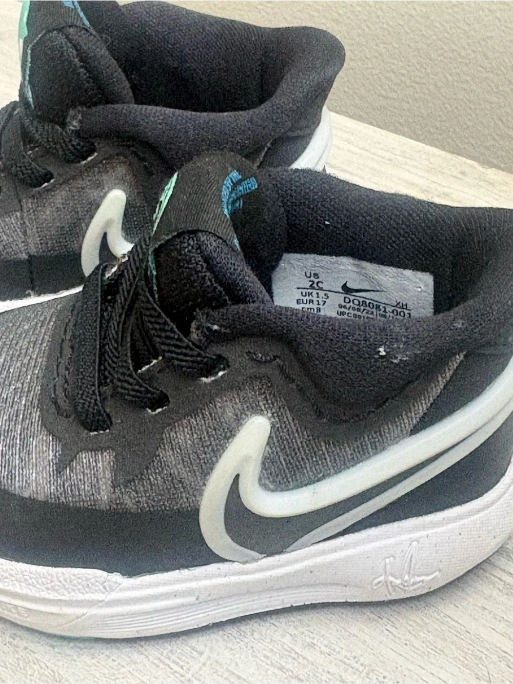 Nike Kids Black Sneakers with Teal Accents
